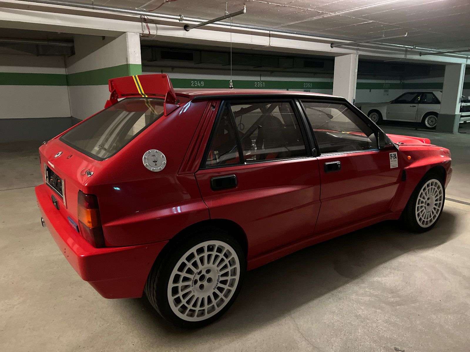 Lancia Delta Sedan in Red used in Starnberg for € 189,900.-